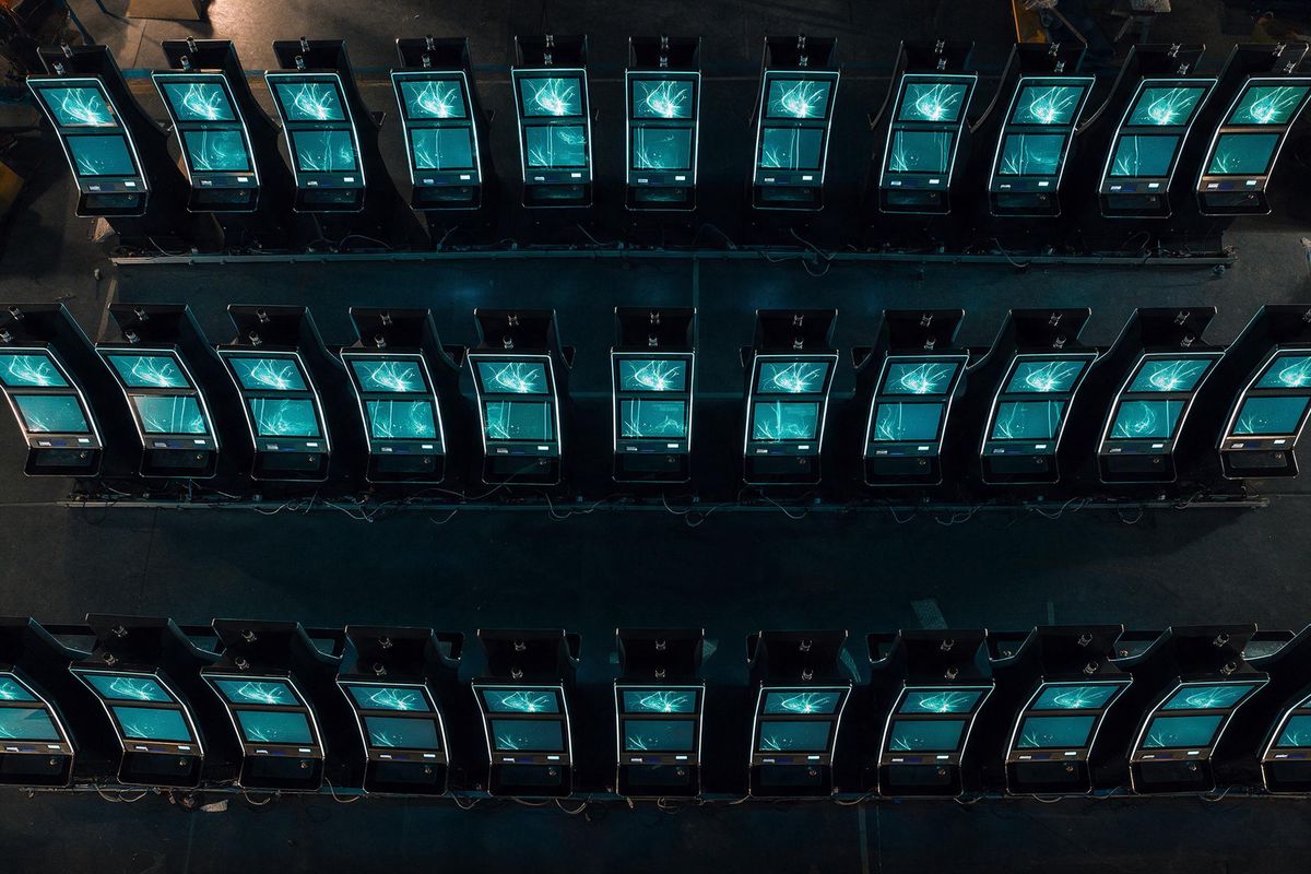 Overhead view of gaming terminals arranged in rows during installation